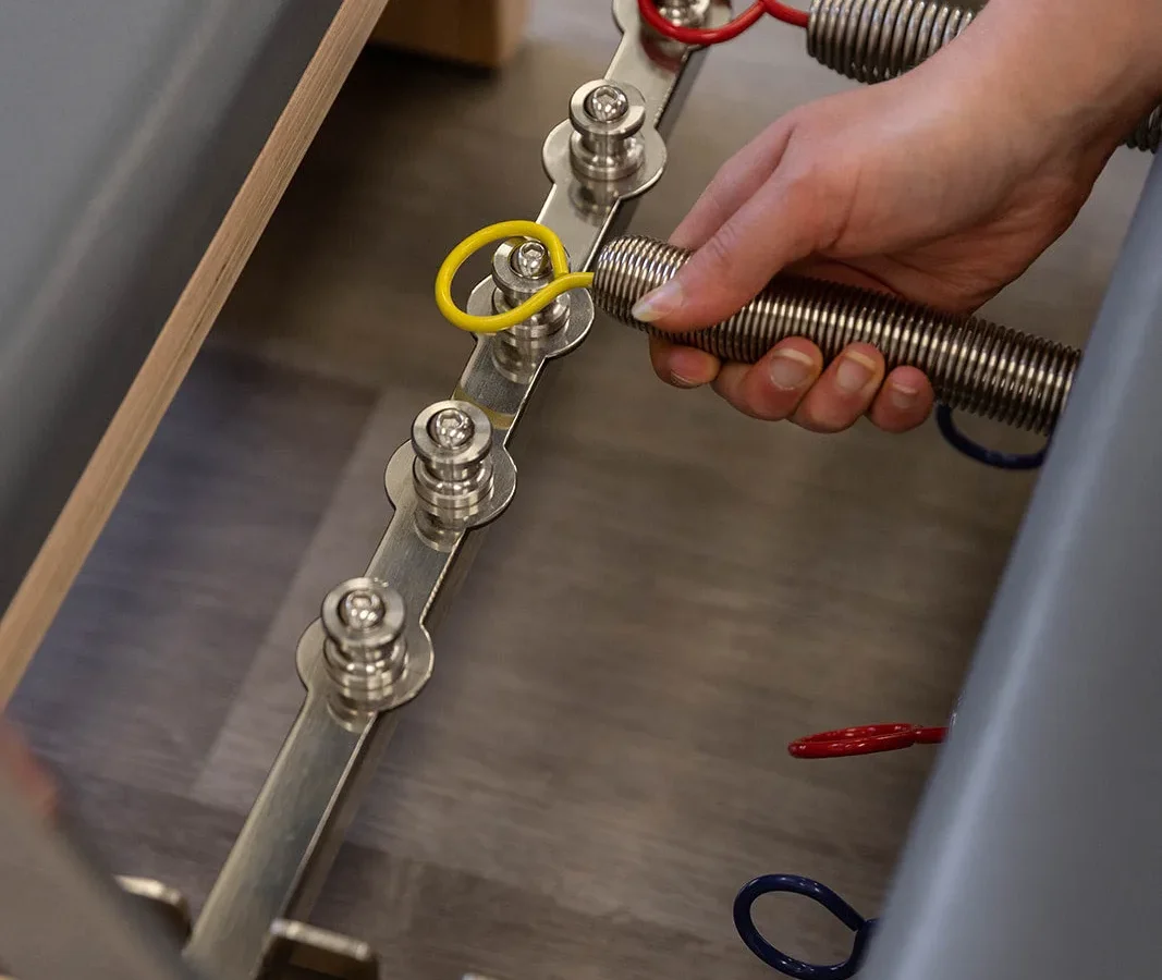 why is a reformer spring clip hard to open